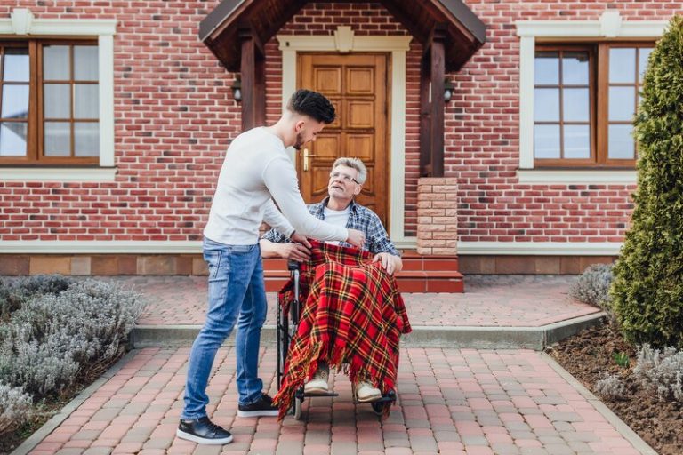 [fpdl.in]_son-helping-his-father-wheelchair-near-nursing-home_496169-739_medium